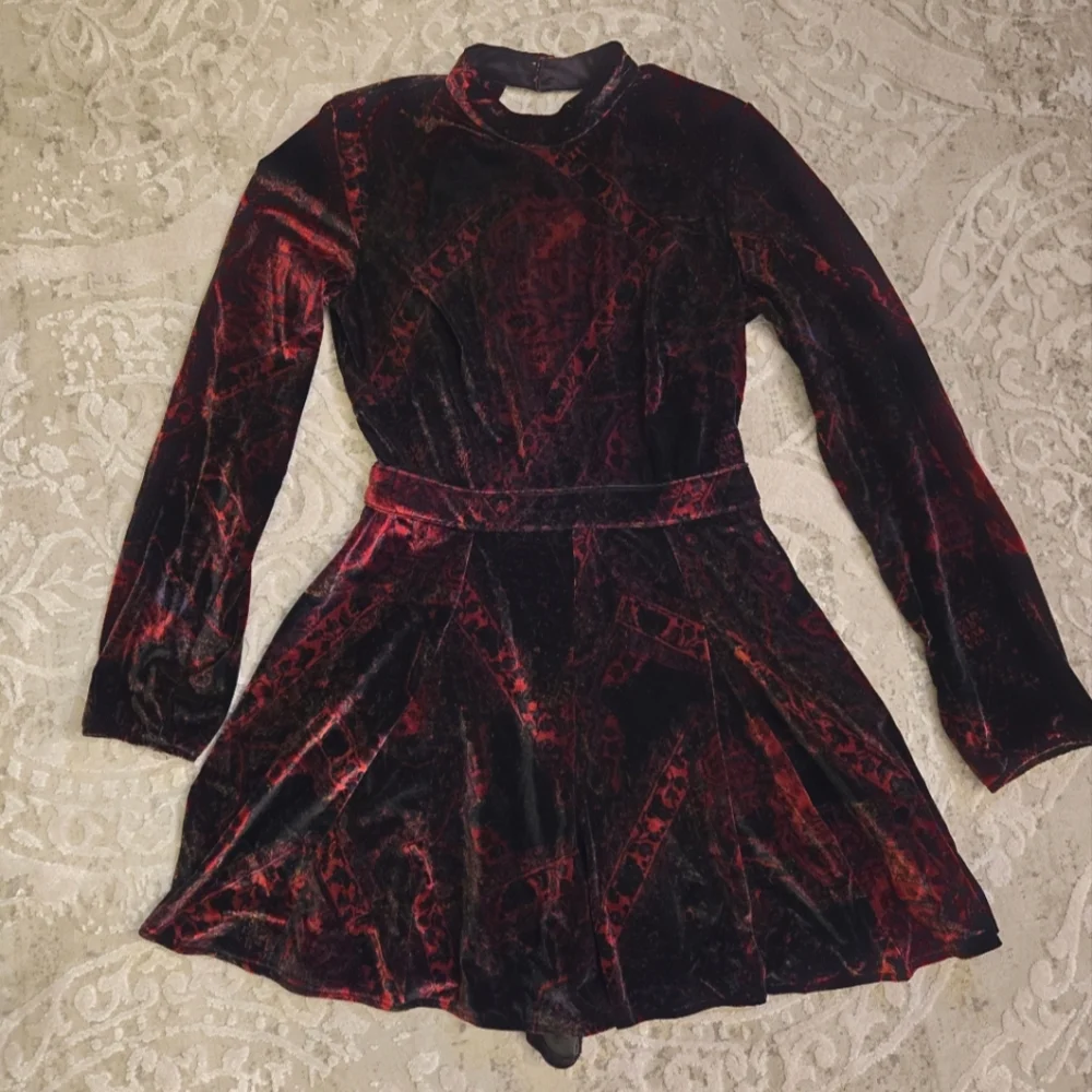 Free People open back, long sleeved red/black velvet romper